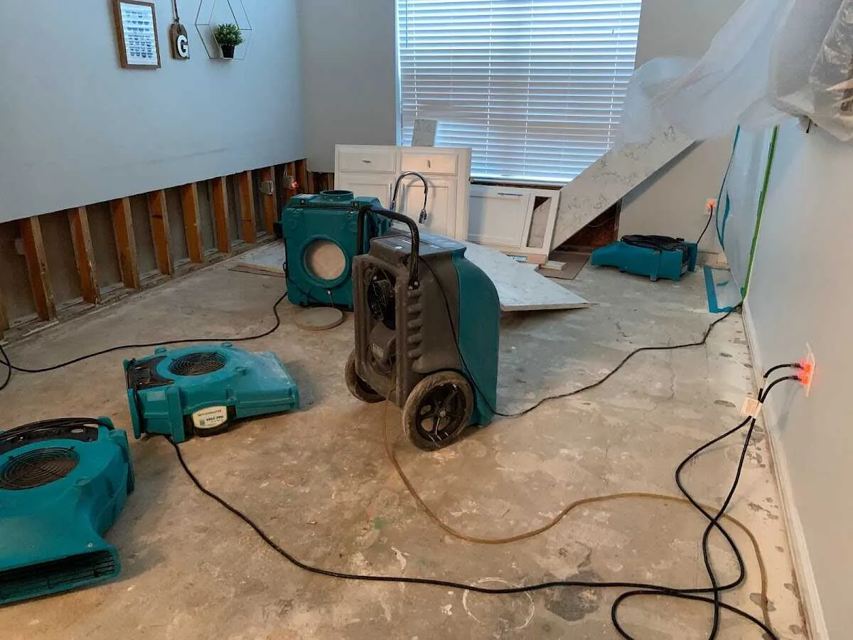 Dehumidifier in flood-cut room for Water Damage Restoration in Marion